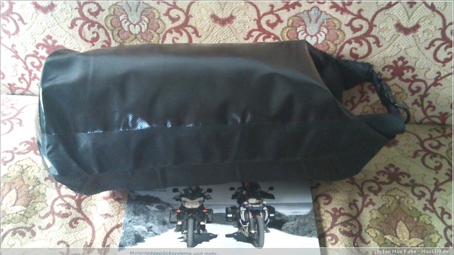 {ops} gefüllter Packsack