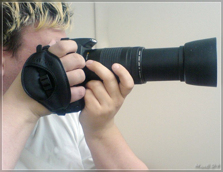 Canon EOS 350D mit Canon E-1, Canon EF 75-300 4-5.6 II und ET-62